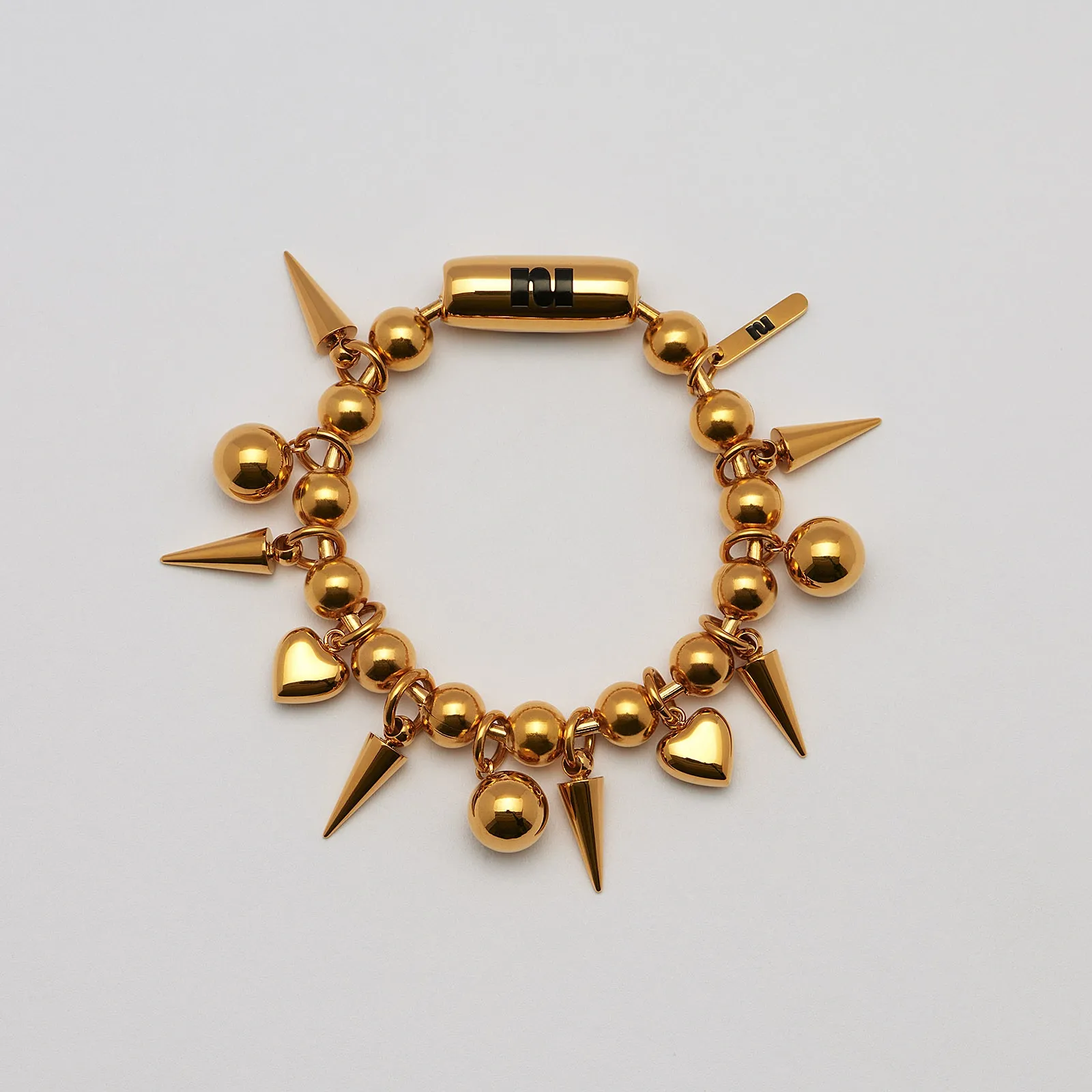 Armband guldpläterat stål, kulor, hjärtan, spikes